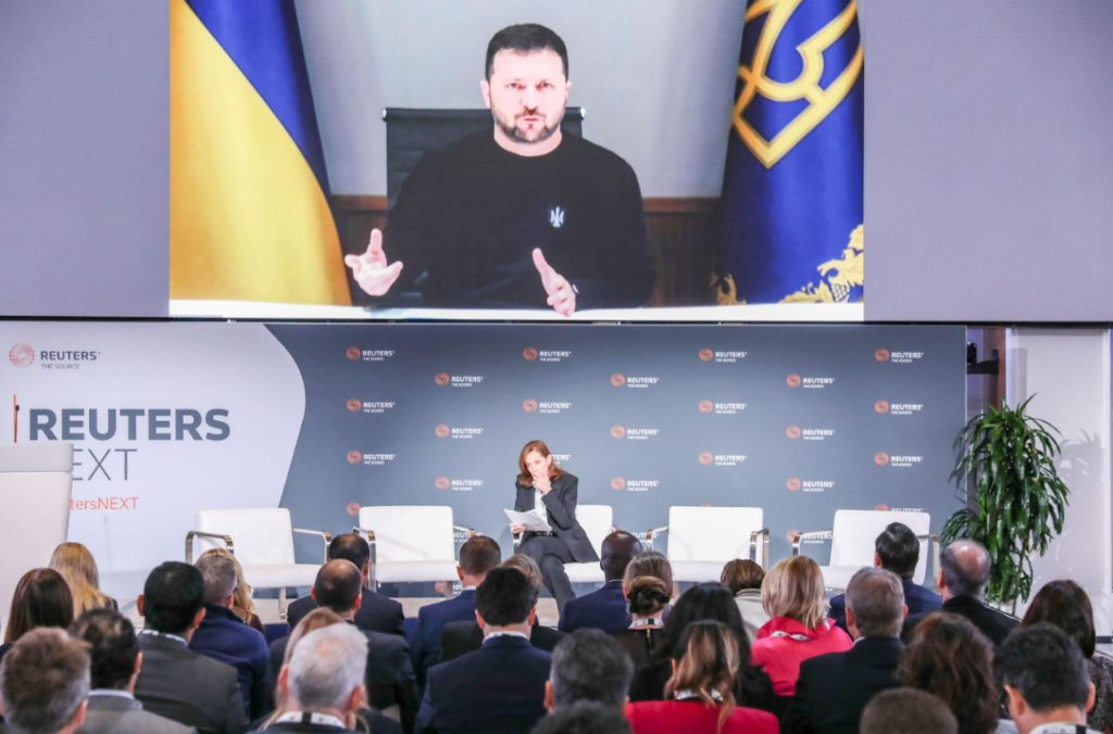 Reuters Customer Service & Experience conference session with keynote audience
