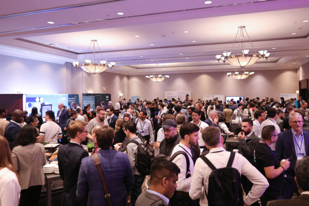 Attendees networking at the Customer Experience for Financial Services Summit
