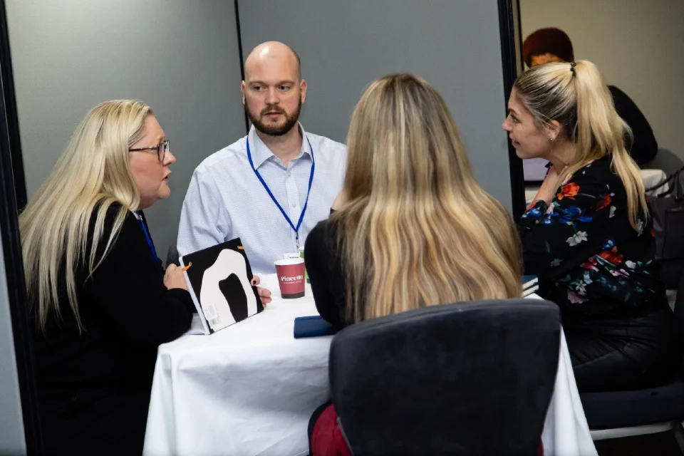 Attendees networking and sharing industry insights at the Contact Centre & Customer Services Summit