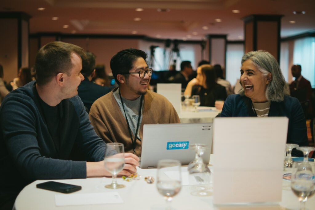 Attendees sharing insights anf networking at the Customer Experience Strategies Summit