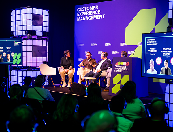 Thought leaders sharing insights during a panel discussion at the Engage Customer Summit