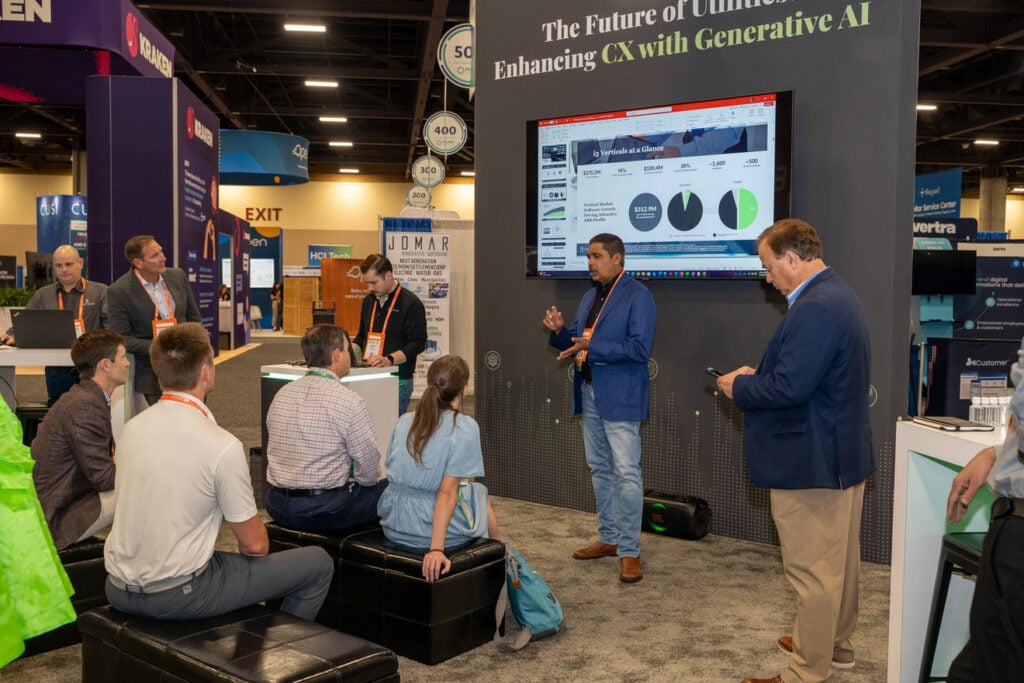 Attendees listening to a generative AI presentation at the IUCX Conference